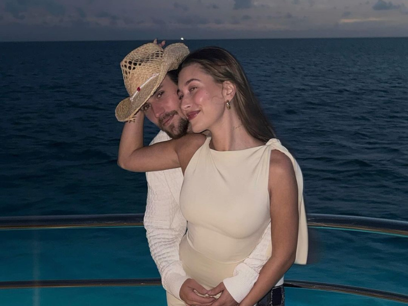 Justin Bieber and his wife Hailey posing on a boat