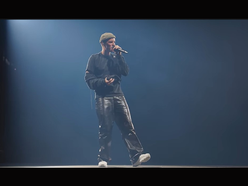 Justin Bieber singing onstage