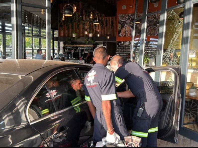 Woman crashes into restaurant at New Salt Rock shopping centre.