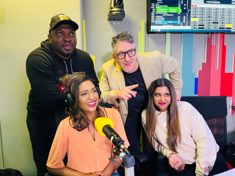 Kass Naidoo at the East Coast Radio studios with the Breakfast team