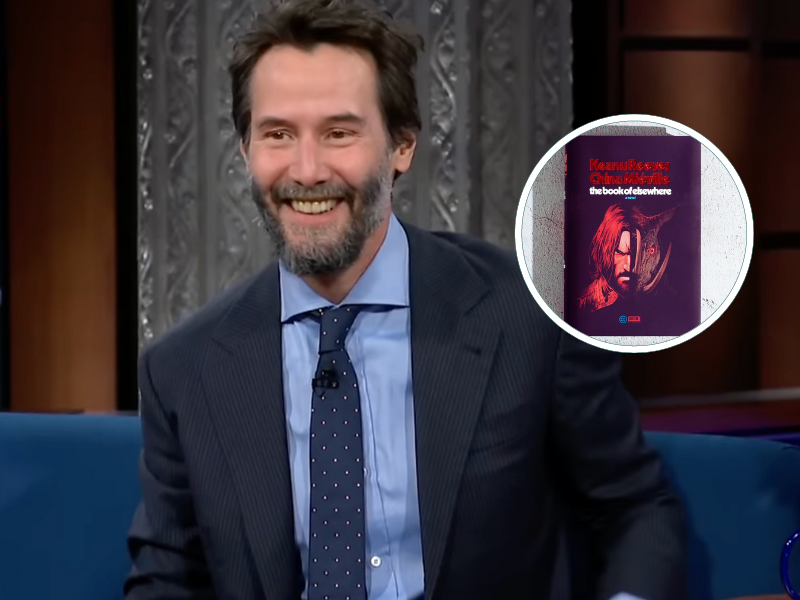 Keanu Reeves wearing a blue suit