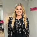 Kelly Clarkson wearing a long sleeved lace top