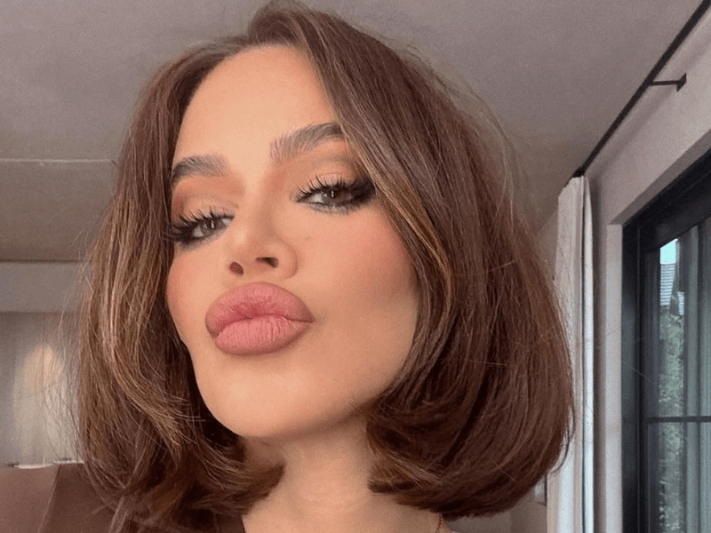 Khloe Kardashian pouts her lips