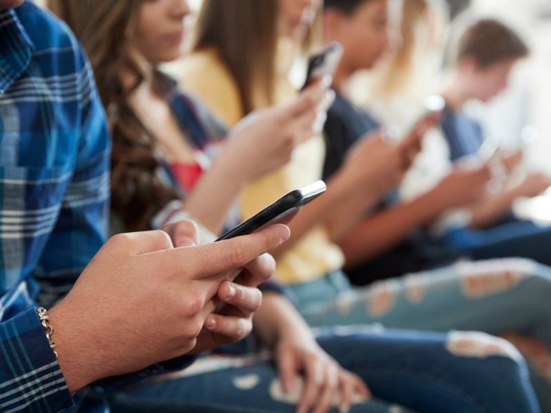 Kids using their smartphones