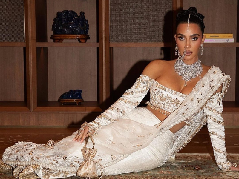 Kim Kardashian wearing a sari and nose ring