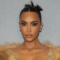 Kim Kardashian's hair pulled into a sleek updo