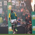 South Africa's Captain and number eight Siya Kolisi runs on the field ahead of the Rugby Championship first round Test match between South Africa and Australia