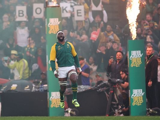 South Africa's Captain and number eight Siya Kolisi runs on the field ahead of the Rugby Championship first round Test match between South Africa and Australia
