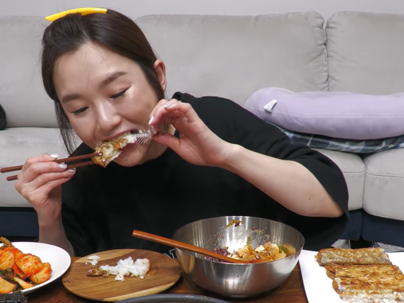 Korean woman eating food
