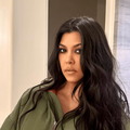 Kourtney Kardashian wearing an oversized green jacket