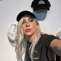 Lady Gaga wearing a black cap