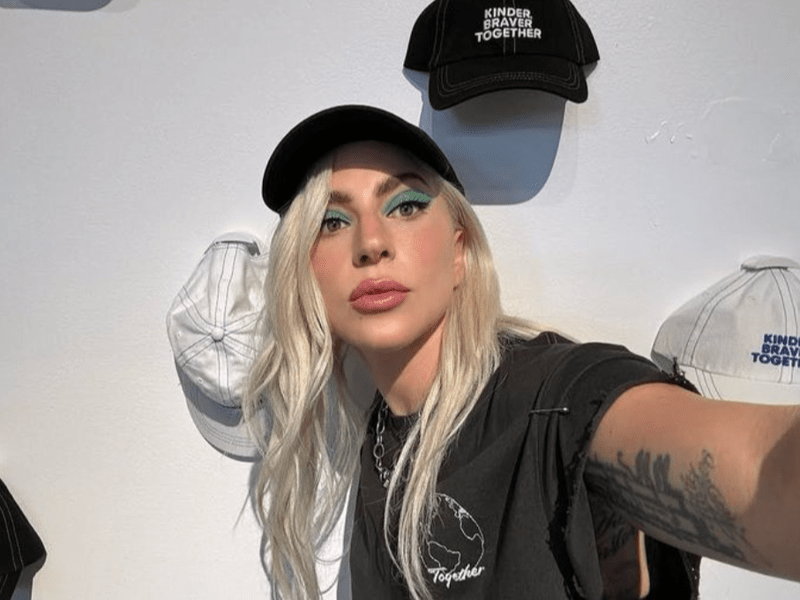 Lady Gaga wearing a black cap