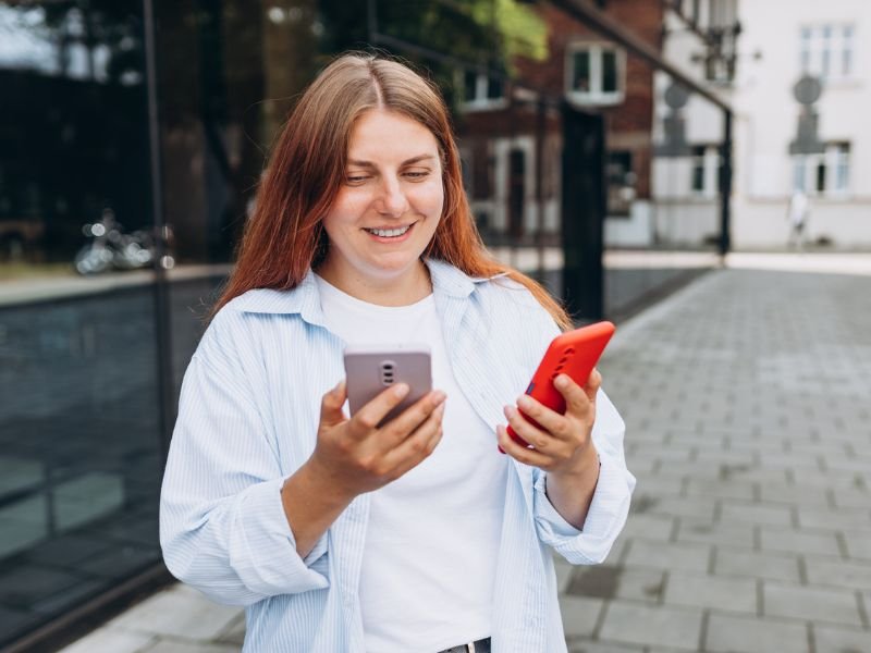Lady with two phones