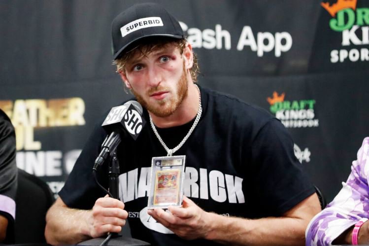 Logan Paul talks and his Charizard Pokemon card