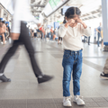 Lost child crying in a public area that is busy