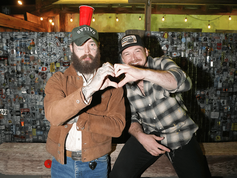 Post Malone and Morgan Wallen make heart sign with hands.png