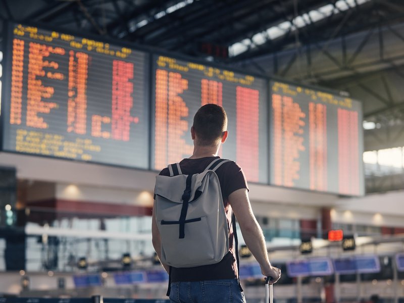MAN AT AIRPORT TIMES