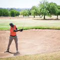MAN PLAYING GOLF JACARANDA FM GOLF DAY