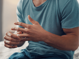 MAN TAKING OFF WEDDING RING
