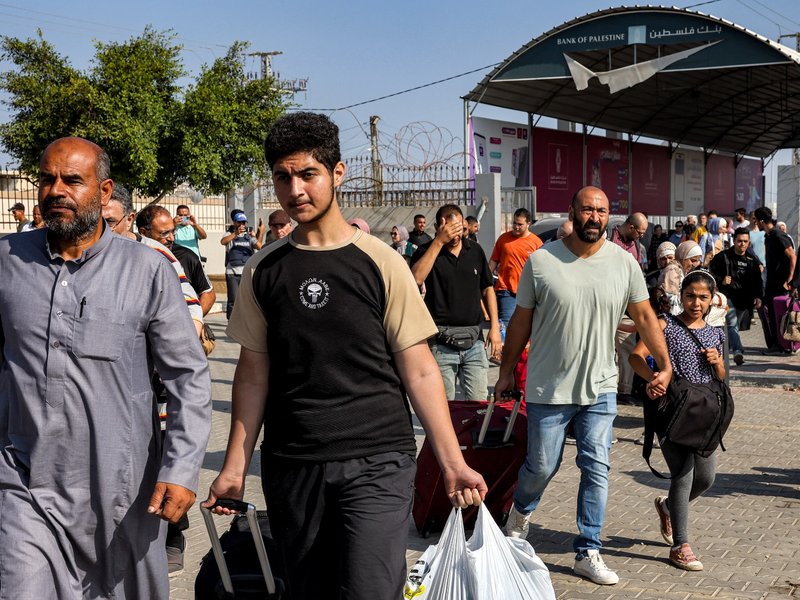 First wounded Palestinians flee shattered Gaza for Egypt