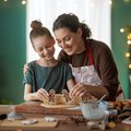 MOM AND DAUGHTER BAKING CHRISTMAS COOKIES