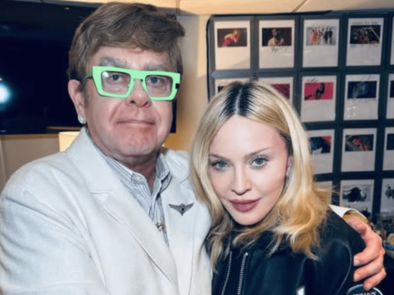 Madonna and Elton John hug backstage