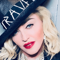 Madonna wearing a black crave hat