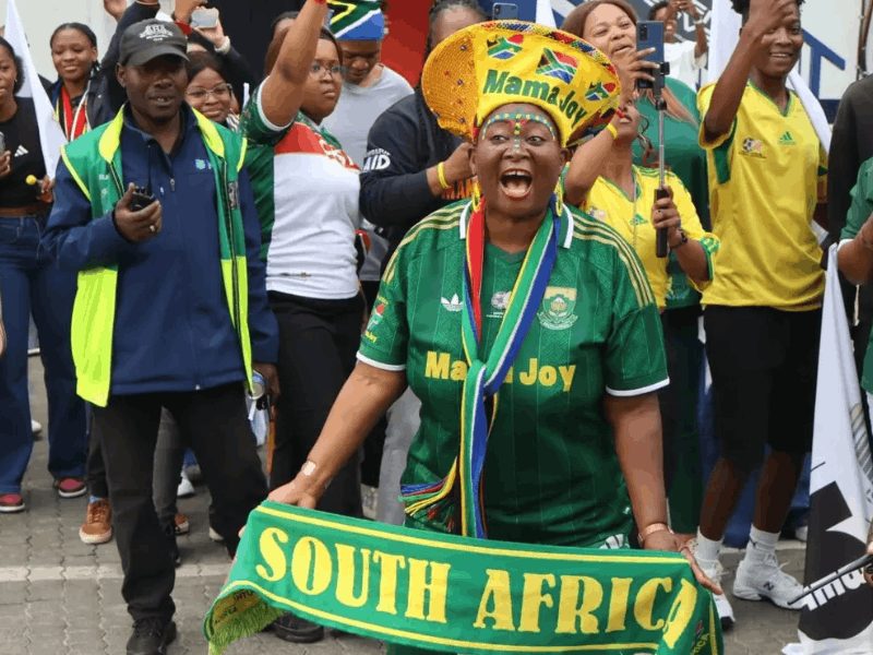 Mama Joy wearing Bafana Bafana gear