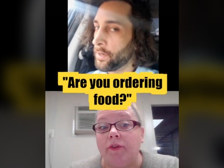 man orders food