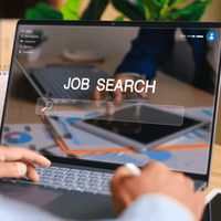 Man using laptop for job search