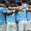 Manchester City players celebrate win