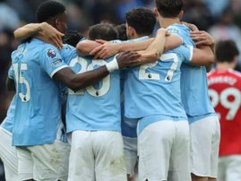 Manchester City players celebrate win