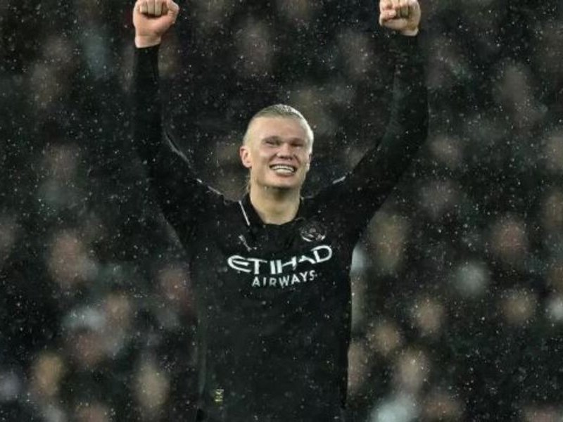 Manchester City striker Erling Haaland celebrates scoring against Fulham