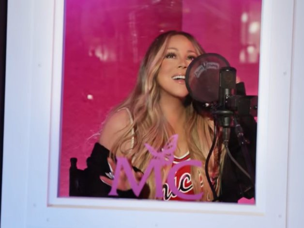 Mariah Carey in Fall in Love at Christmas video