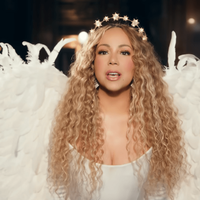 Mariah Carey dressed up as an angel