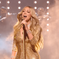 Mariah Carey singing at the 2025 MTV VMAs