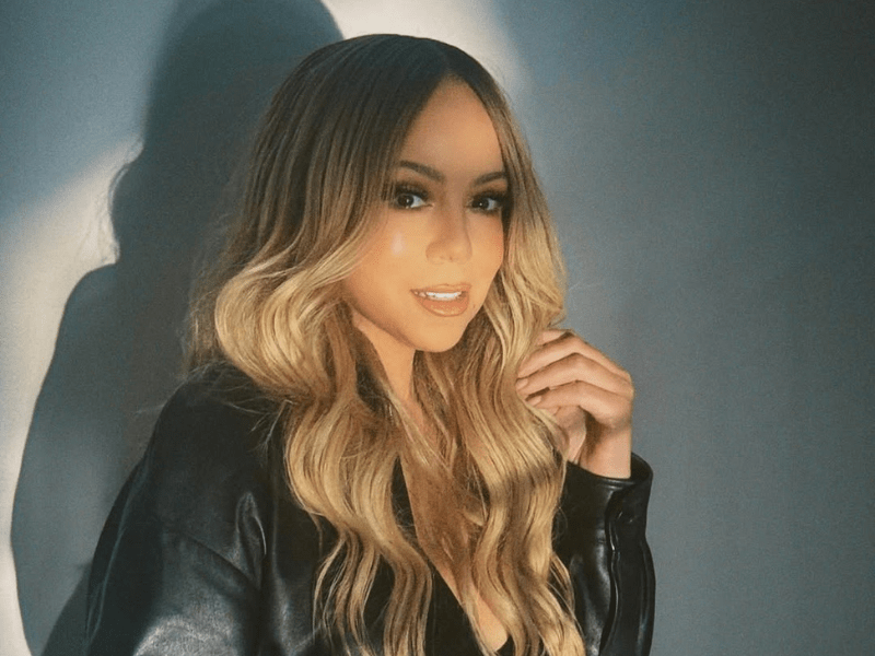 Mariah Carey wearing a leather jacket