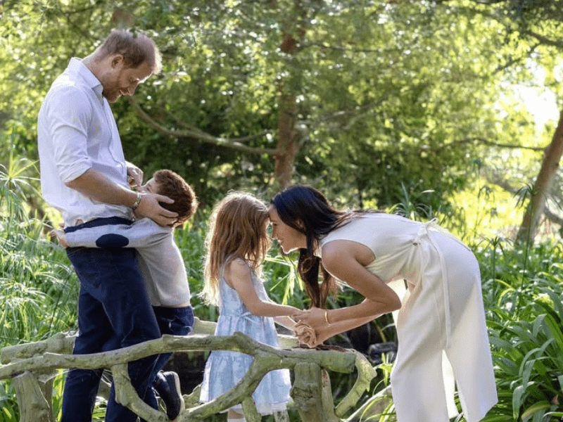 Prince Harry and Meghan Markle with their children