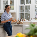 Meghan Markle wearing blue jeans and a shirt