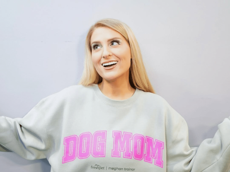 Meghan Trainor wearing a dog mom sweatshirt