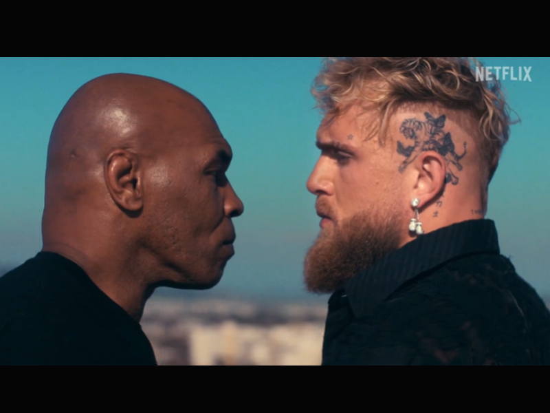 Mile Tyson and Jake Paul staring at each other