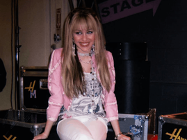 Miley Cyrus as Hannah Montana