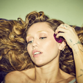Miley Cyrus with long wavy blonde hair