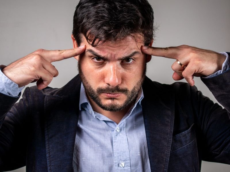 Man attempting to read mind