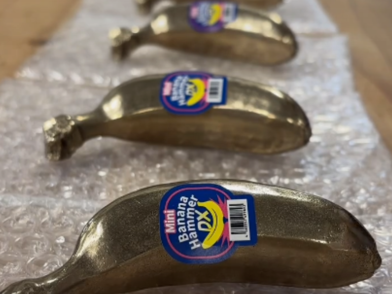 Mini banana shaped hammers lined up on bubblewrap