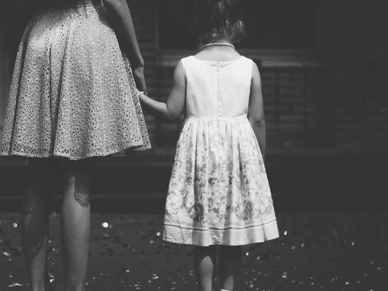 Mom and daughter from behind