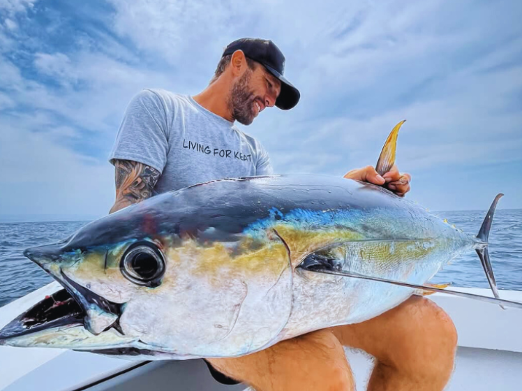 Ruan Irving with a massive Yellowfin Tuna caught at Shelly beach