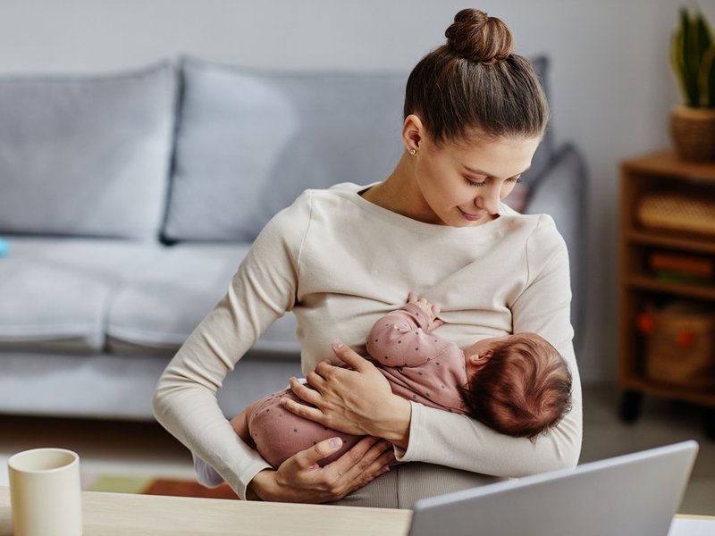 Mother Cradling Baby