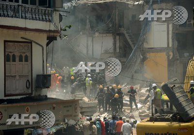 Three dead, dozens feared trapped in Mumbai building collapse