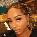 Rapper Nadia Nakai with honey blonde braids